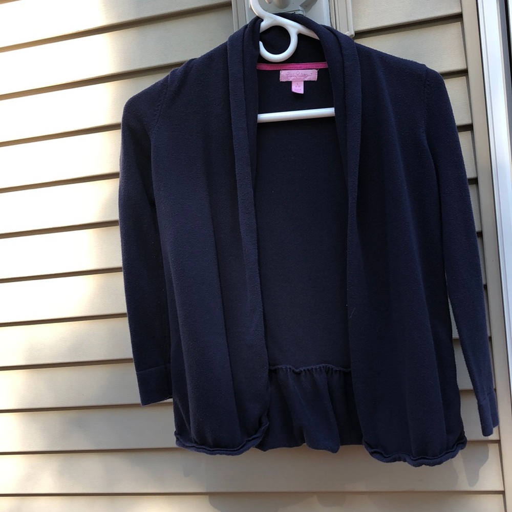 Girls large Lilly Pulitzer navy cotton cardigan. Cute ruffle bottom back.